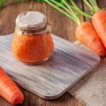 canned carrot sauce salad with garlic and horseradish in a jar with fresh vegetables recipe homemade t20 aa4w1Y