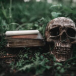 black magic book with occult symbols and skull 2021 08 26 16 26 39 utc