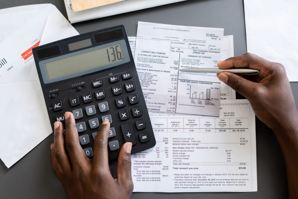 checking receipts using calculator 2021 12 09 15 12 43 utc