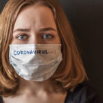 close up portrait of a girl in an icy mask on her face with suspected coronavirus new t20 E0Wrg7