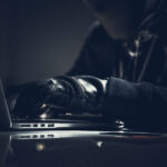 masked computer hacker in dark room 2021 08 28 01 00 07 utc