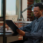 african american employee analyzing e shopping rep 2022 01 04 23 27 37 utc