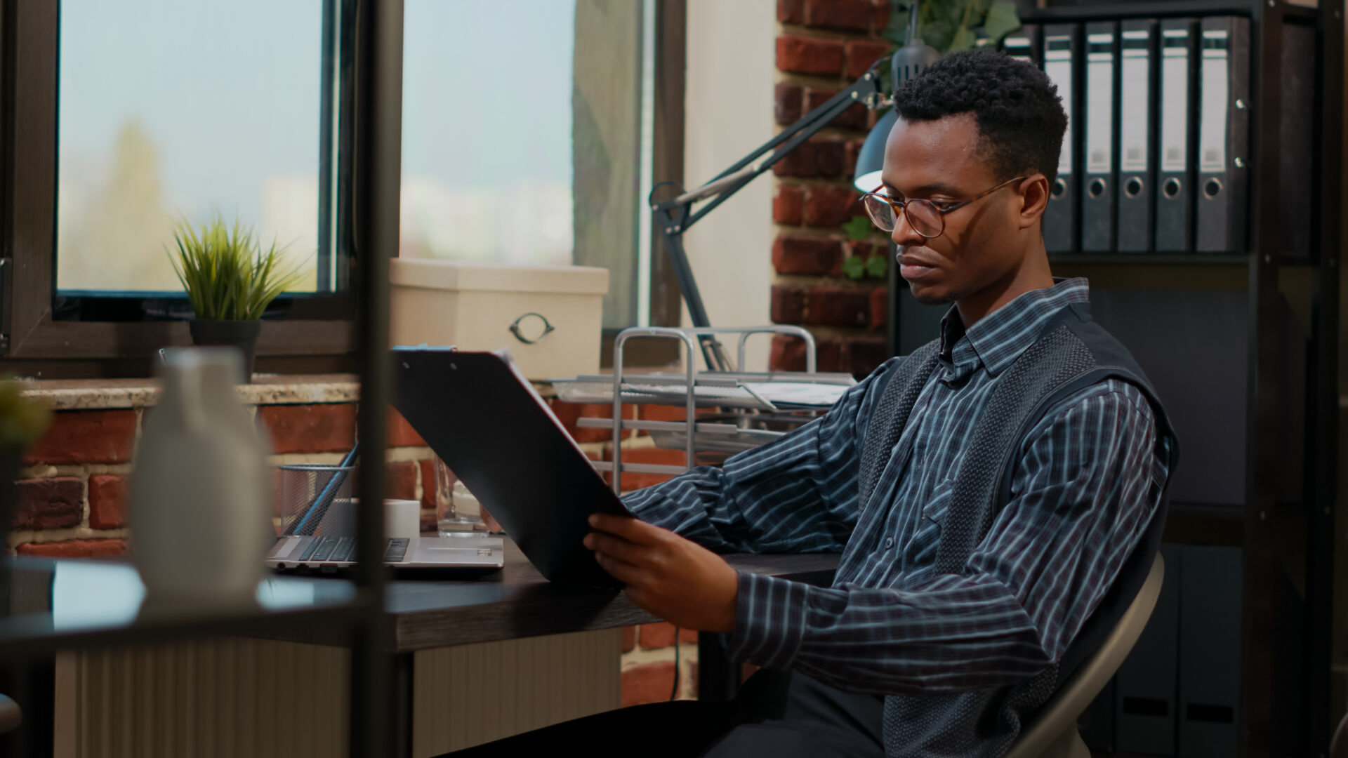 african american employee analyzing e shopping rep 2022 01 04 23 27 37 utc
