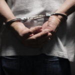 criminal in handcuffs 2021 08 26 22 29 57 utc