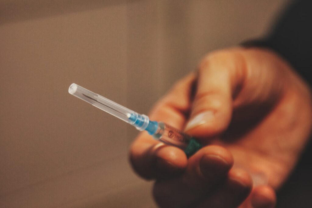 hand in holding syringe with an injection concept 2022 08 01 04 03 38 utc