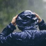 traveler in heavy rain 2022 02 08 22 39 24 utc