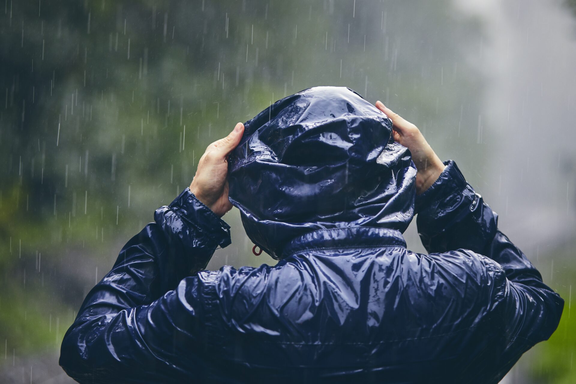 traveler in heavy rain 2022 02 08 22 39 24 utc