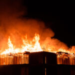 burning building roof at night 2022 09 06 23 59 40 utc