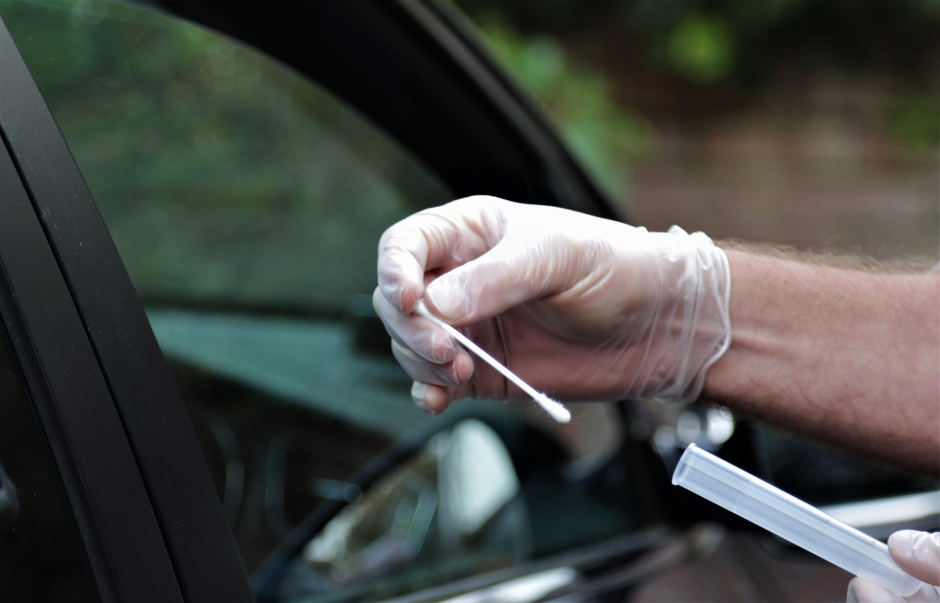 hands of nurse testing for coronavirus at mobile t 2021 10 16 11 17 08 utc