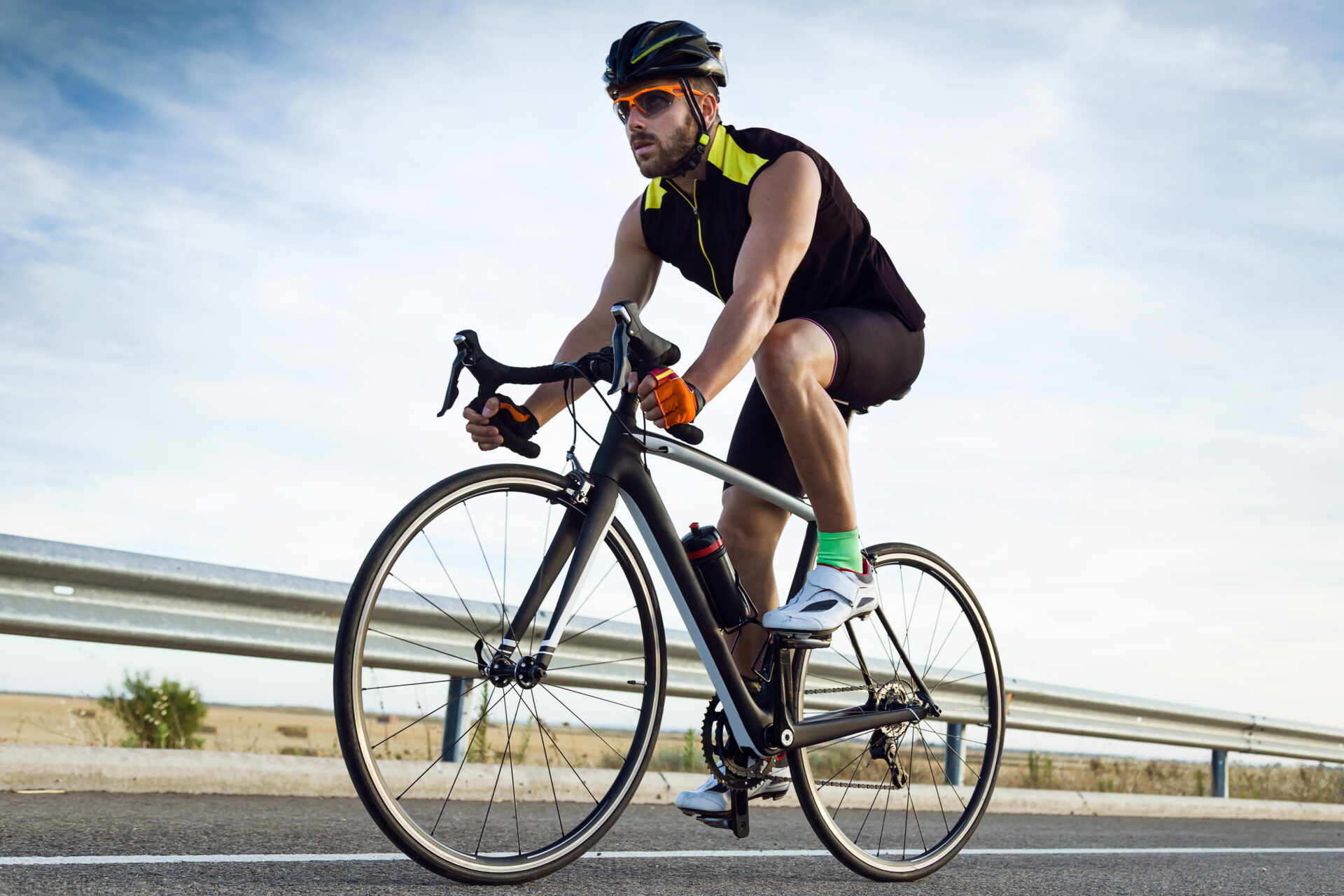 handsome young man cycling on the road 2022 02 02 04 51 02 utc