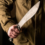 man holding a machete in his hand 2022 02 08 03 26 44 utc