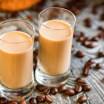 shots of cream liqueur with coffee beans 2021 08 26 19 56 56 utc
