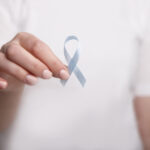 woman holding blue ribbon child abuse awareness 2021 08 28 12 48 09 utc
