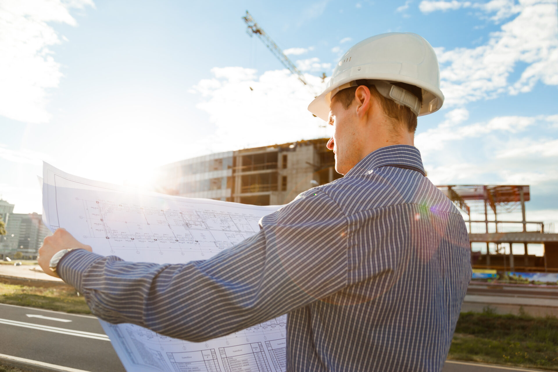 architect in helmet with blueprints looks at camer 2022 03 30 20 23 41 utc