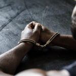 arrested man with handcuffs on wrists 2022 09 16 08 24 22 utc