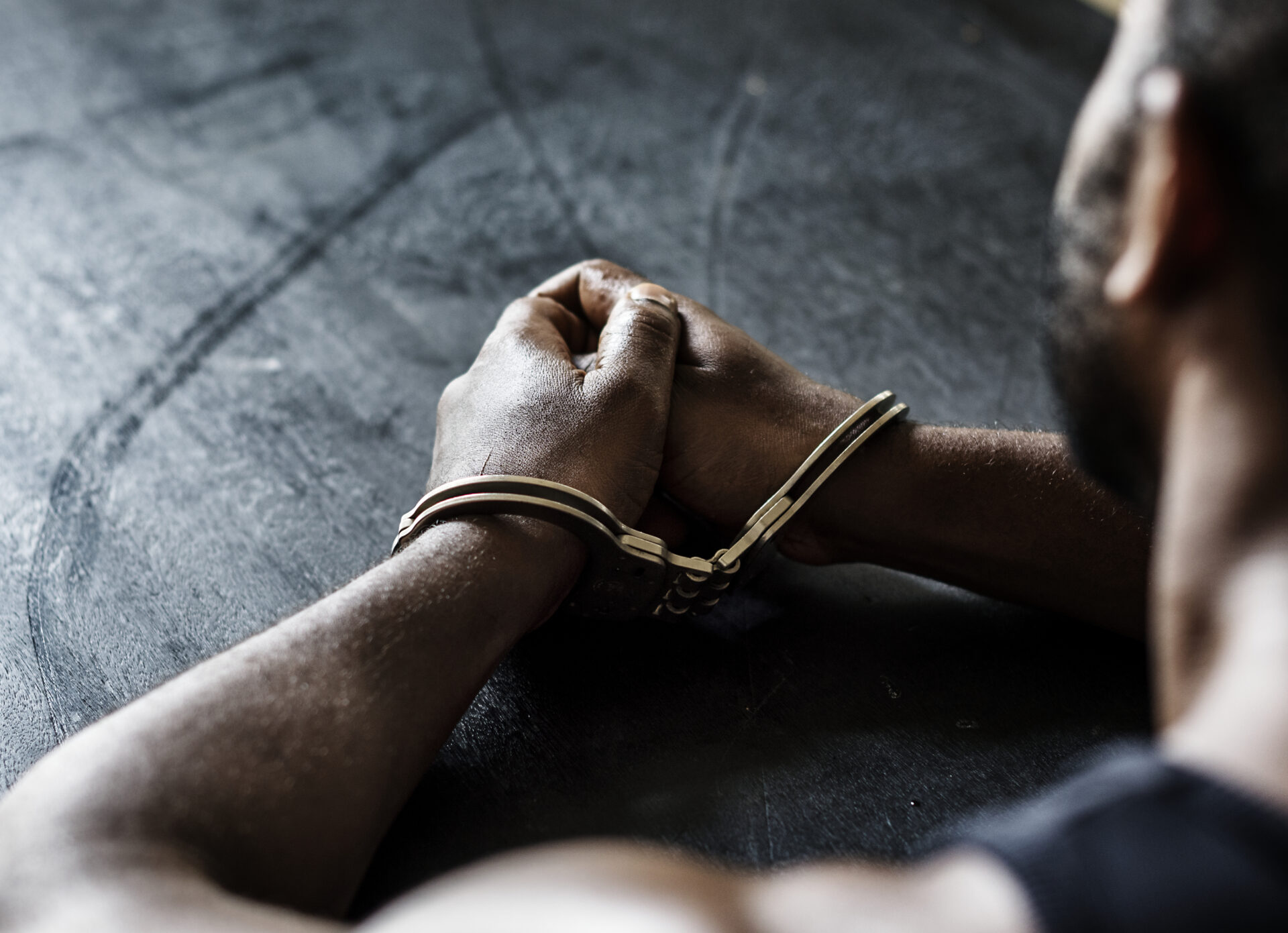 arrested man with handcuffs on wrists 2022 09 16 08 24 22 utc