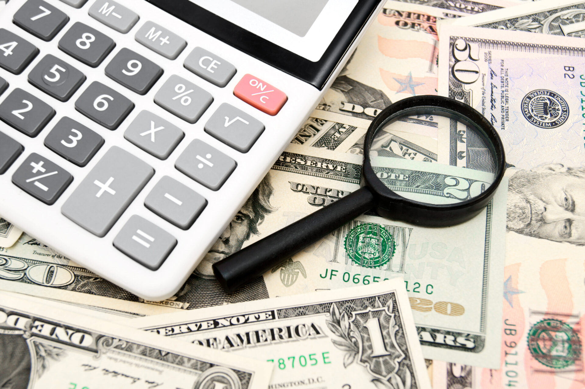 calculator and magnifier on money 2021 09 03 10 17 18 utc