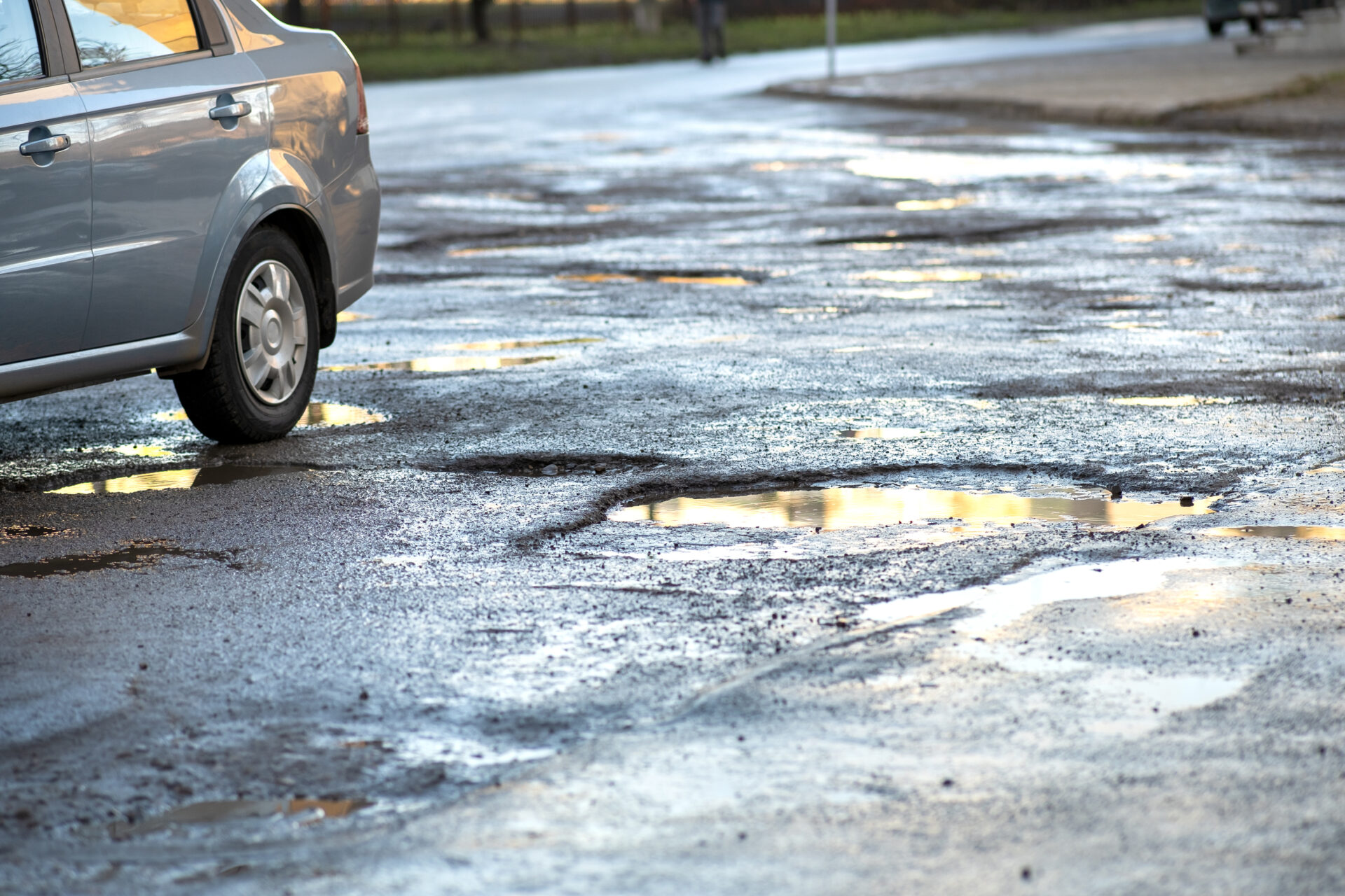 close up of car wheel on a road in very bad condit 2022 01 19 19 51 19 utc