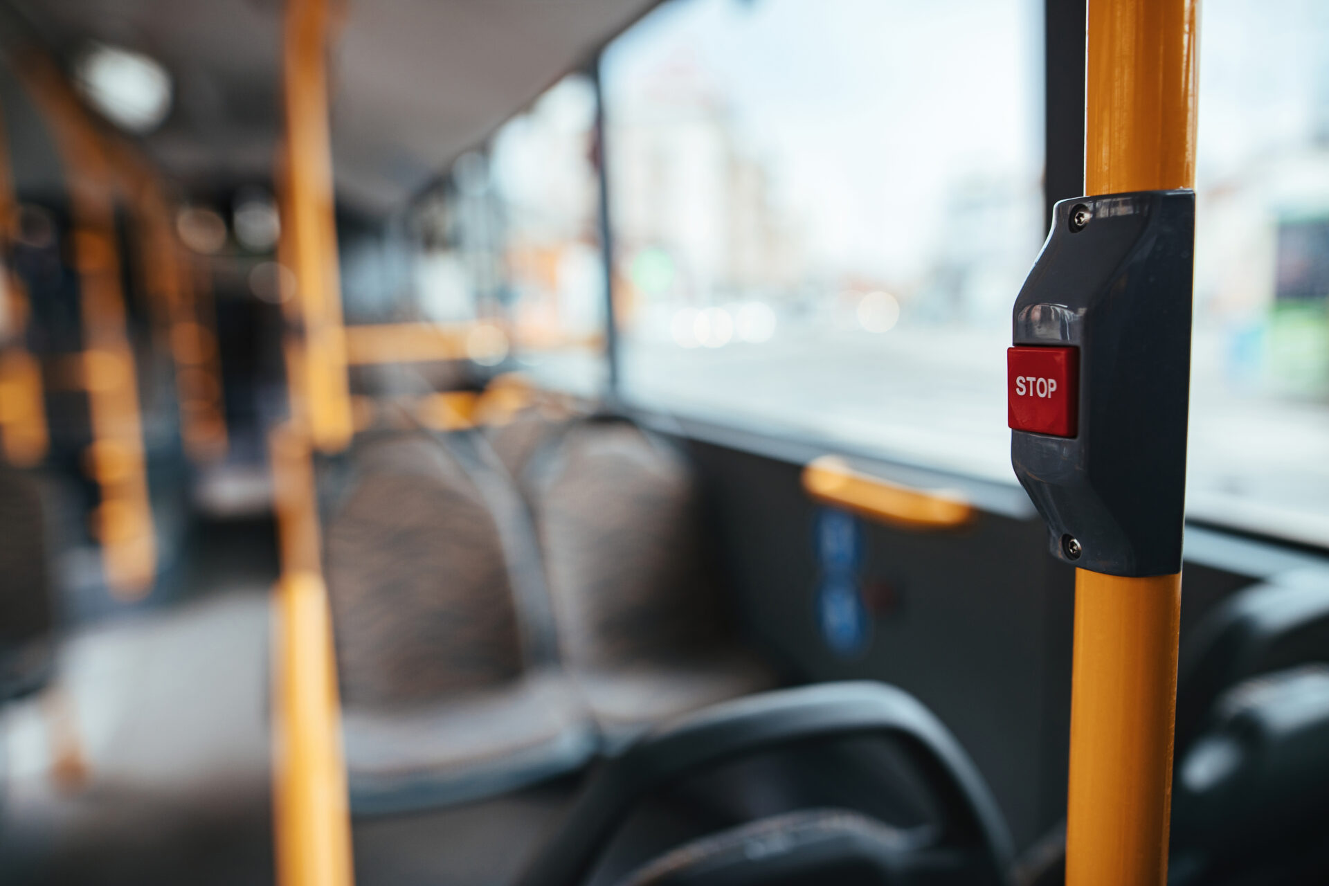closeup of handle in empty bus during global coronavirus epidemic