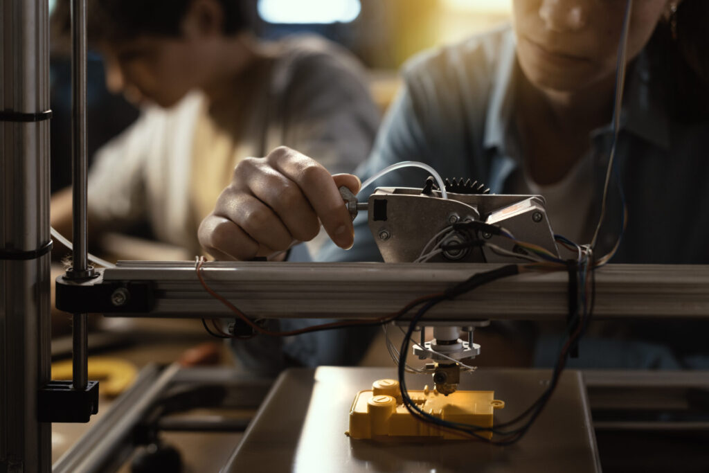 smart students using a 3d printer 2022 01 19 00 21 34 utc