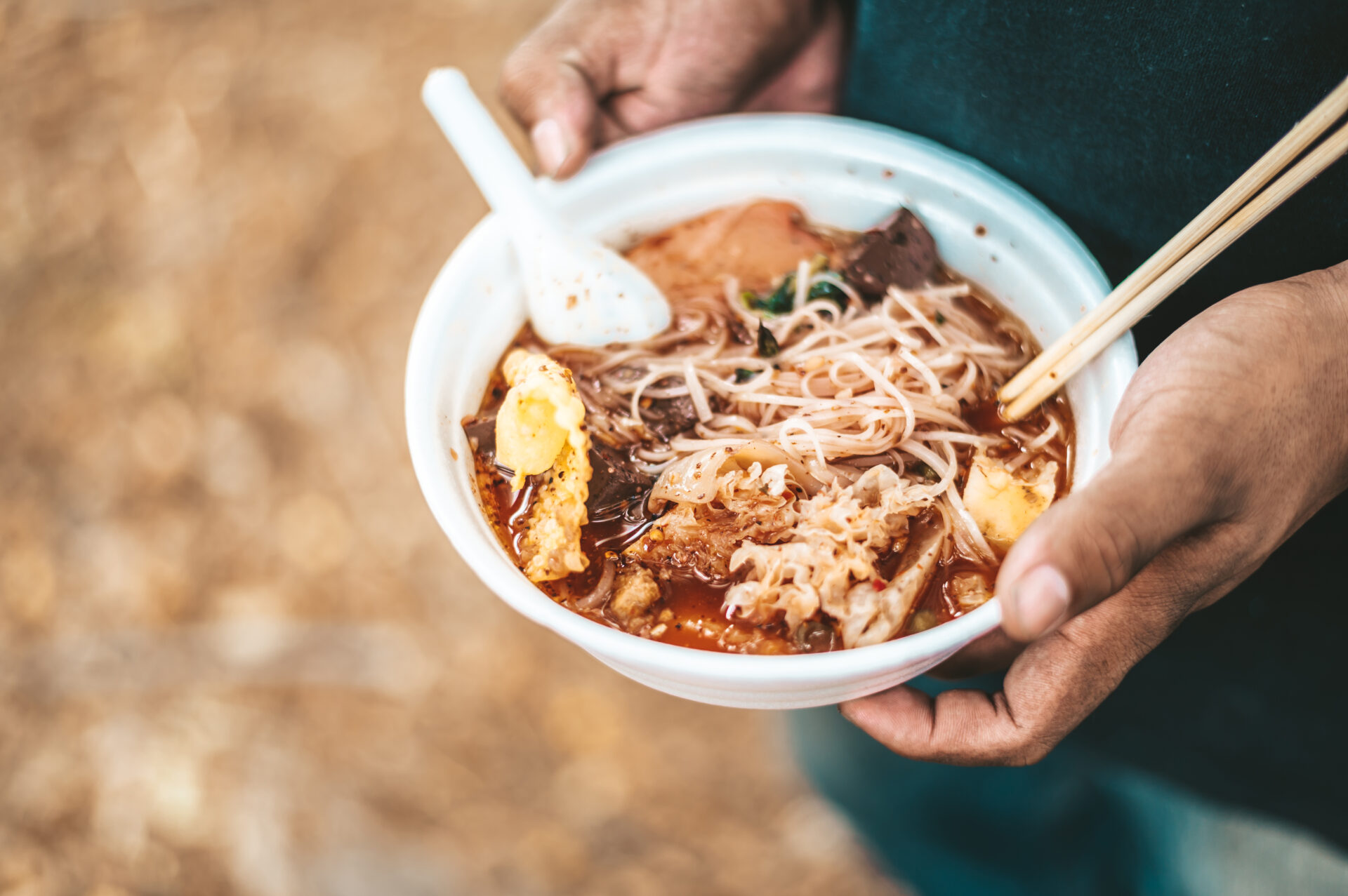 the beggar stands to hold with noodles in a foam c 2021 08 31 12 51 03 utc