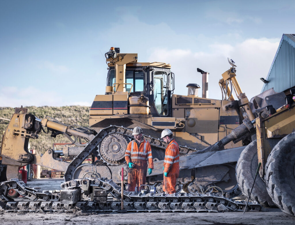 apprentice and engineer work on machinery in surfa 2022 03 08 00 23 18 utc