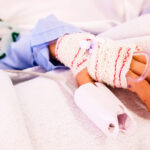 bandaged hand of a child in a hospital whose pulse 2022 05 23 23 10 53 utc