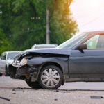 damaged in car accident vehicle on city street cra 2022 03 30 00 07 38 utc