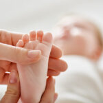 doctor examining a baby 2021 08 26 15 29 34 utc