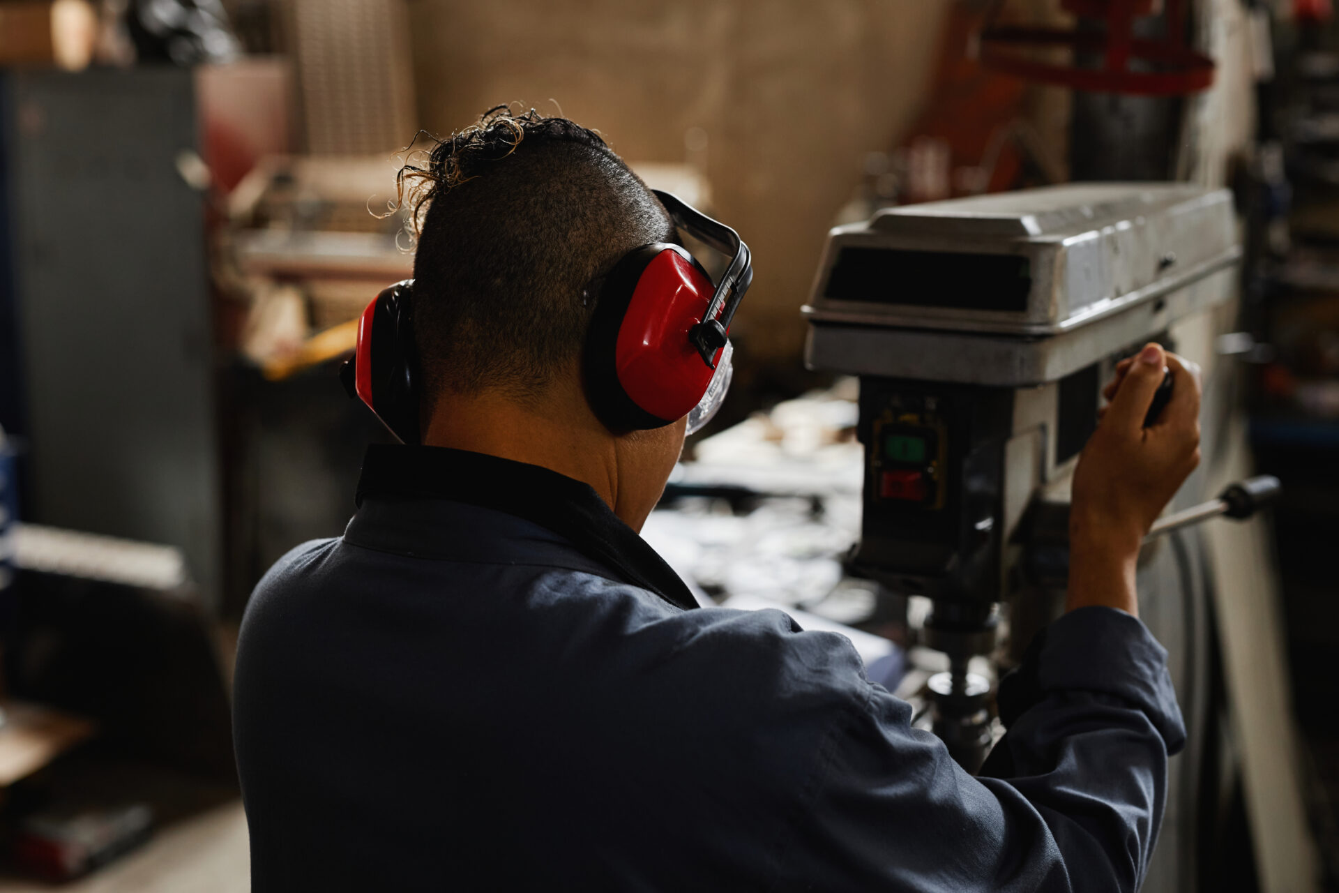 female worker wearing ear protection at factory 2022 09 26 21 02 01 utc