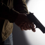 man holding a gun 2021 09 03 01 31 59 utc