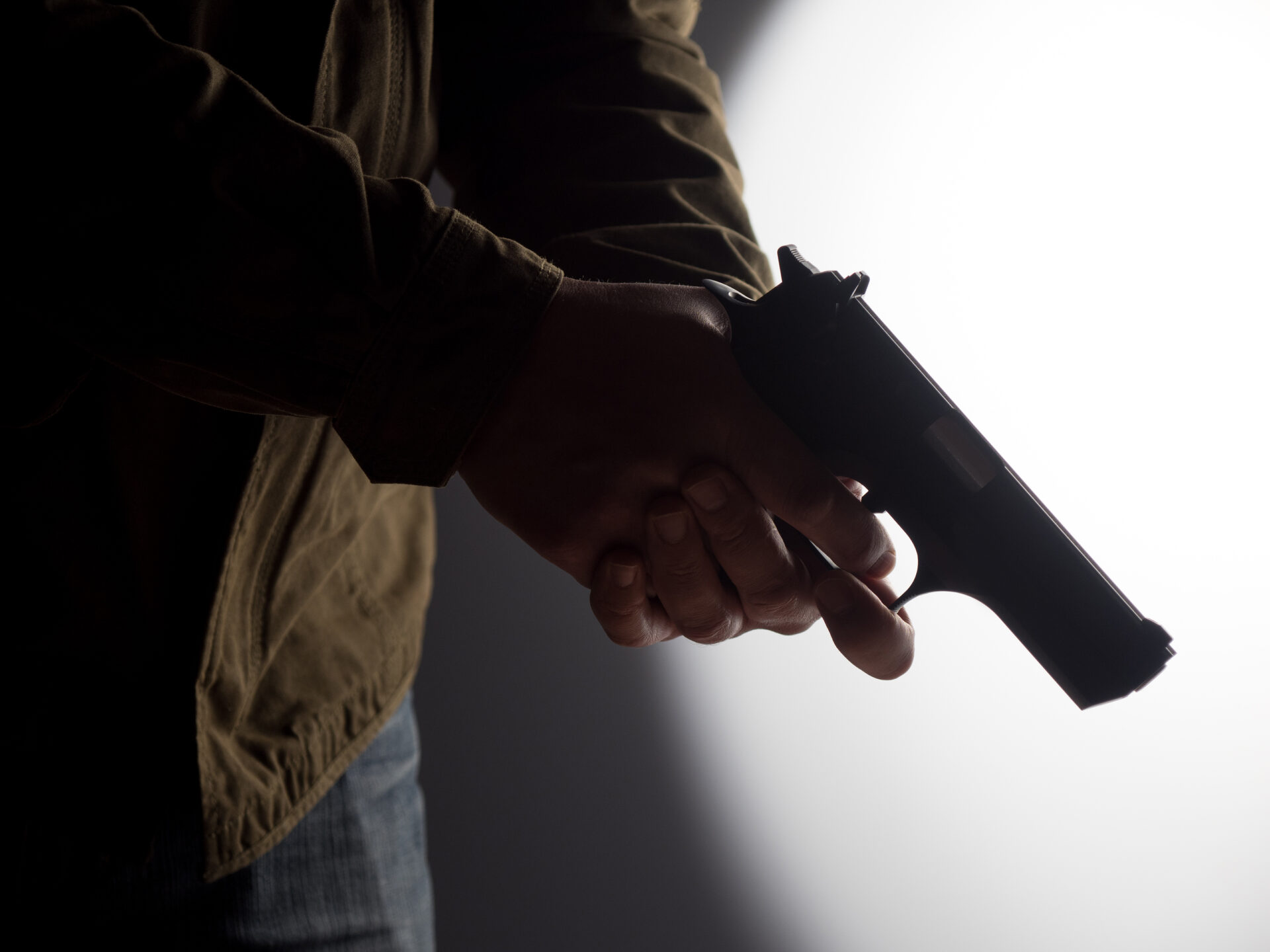 man holding a gun 2021 09 03 01 31 59 utc