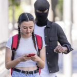 man with balaclava on his head stealing cell phone 2022 07 26 02 37 00 utc