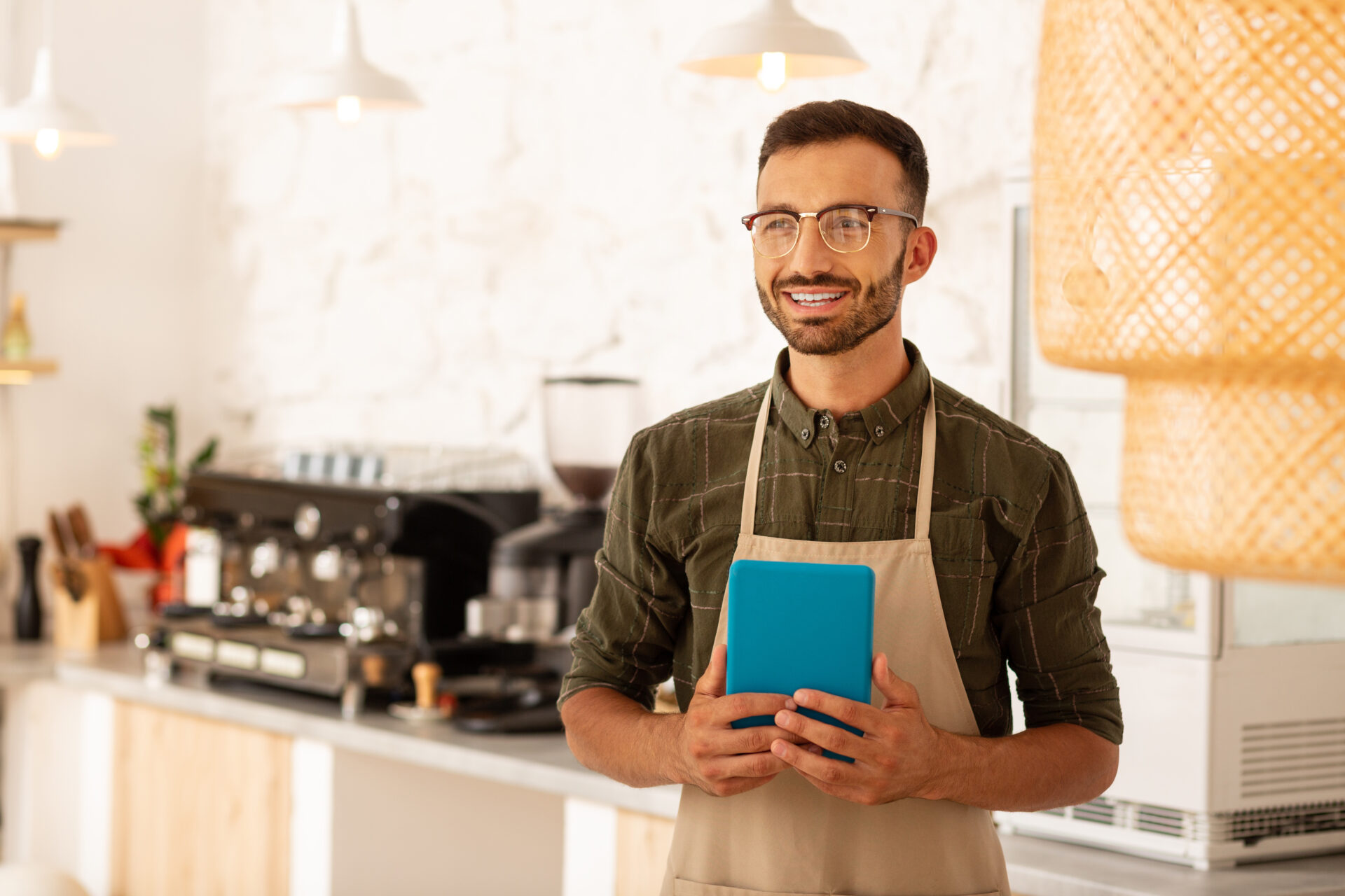 bearded businessman owning coffee shop holding tab 2022 02 03 07 02 22 utc
