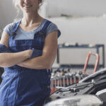 female mechanic posing next to a car 2022 01 19 00 21 36 utc