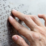 finger reading braille tactile on public park mess 2021 09 01 22 38 02 utc