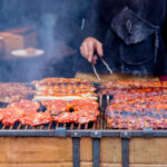 grilled meat with smoke on christmas fair 2022 01 12 18 43 25 utc
