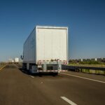 view from behind of tractor trailer trucks driving 2022 11 16 00 05 30 utc