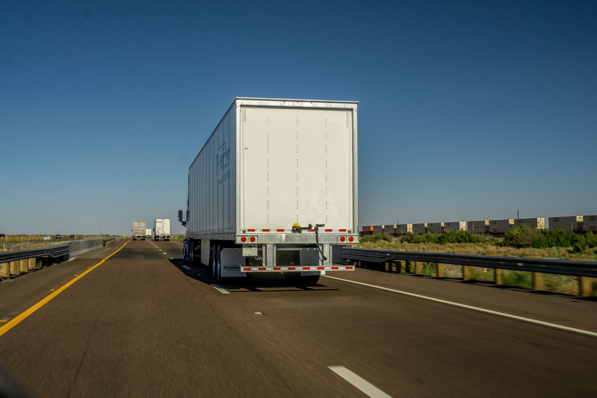 view from behind of tractor trailer trucks driving 2022 11 16 00 05 30 utc