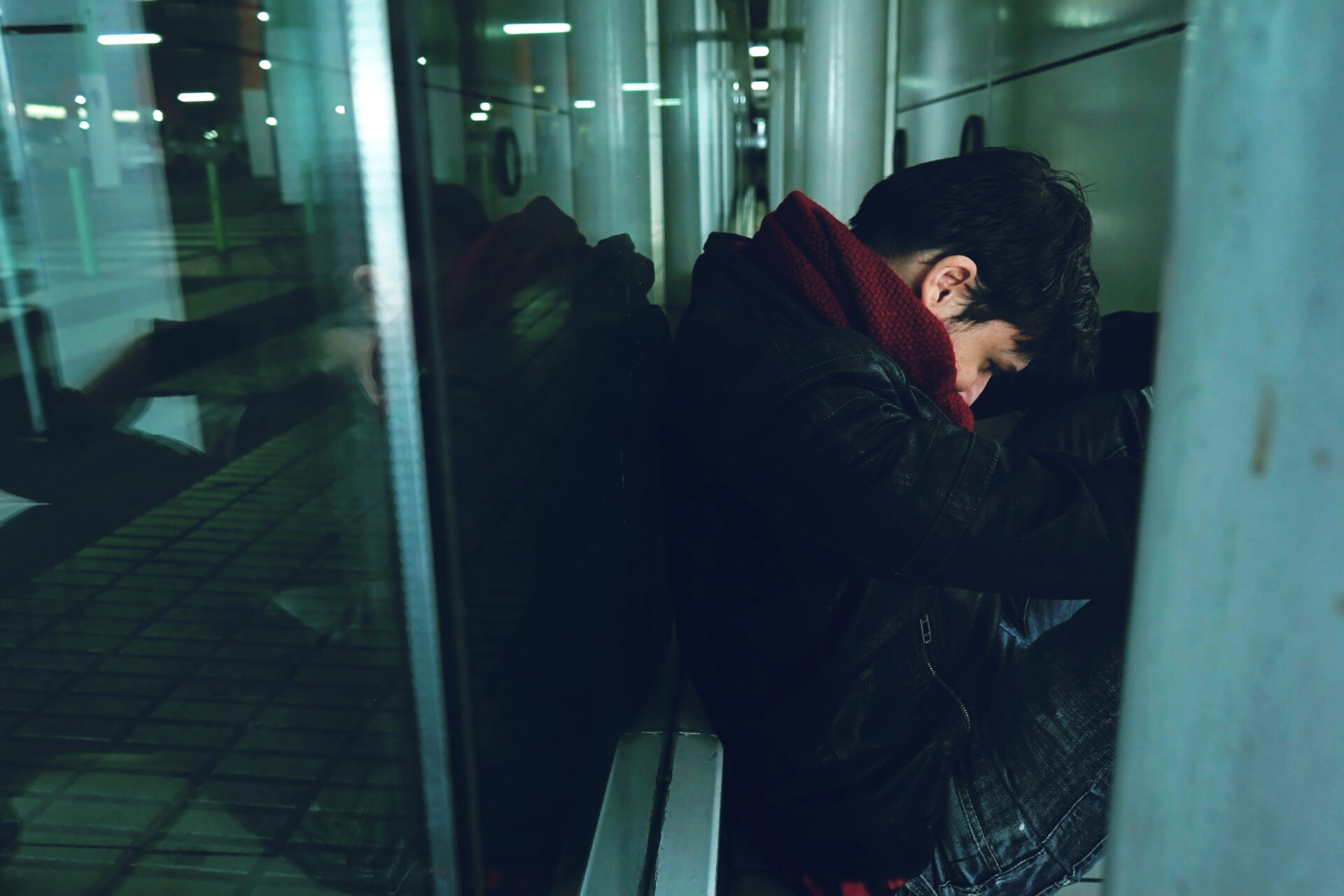 young man alone in a bus station at night 2021 08 29 02 14 11 utc