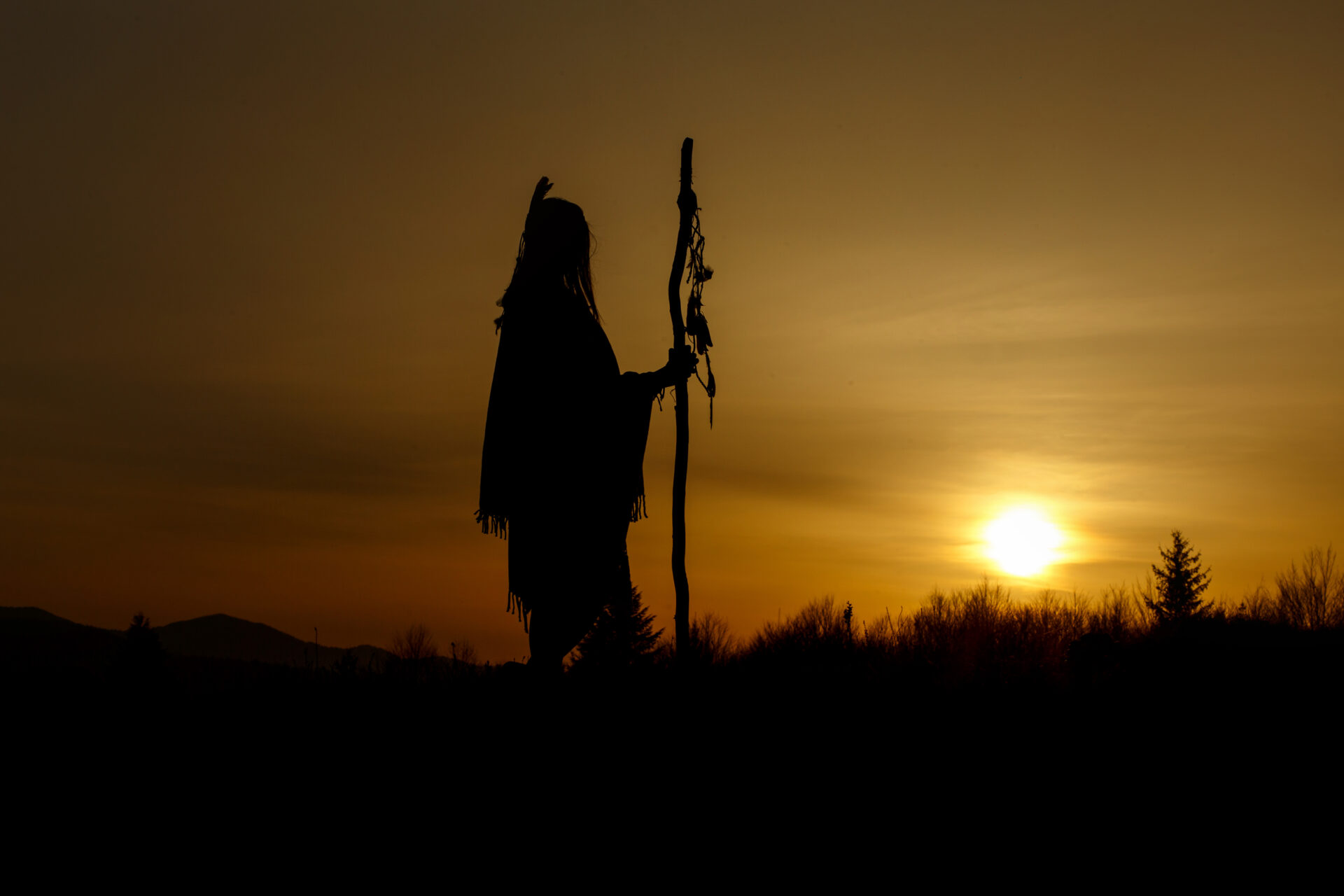 silhouette of native american shaman with pikestaf 2021 08 29 09 01 46 utc