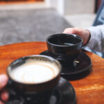 closeup image of a couple people drinking coffee t 2022 12 16 04 57 31 utc