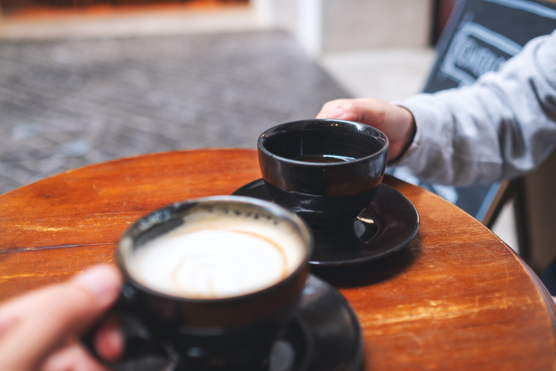 closeup image of a couple people drinking coffee t 2022 12 16 04 57 31 utc