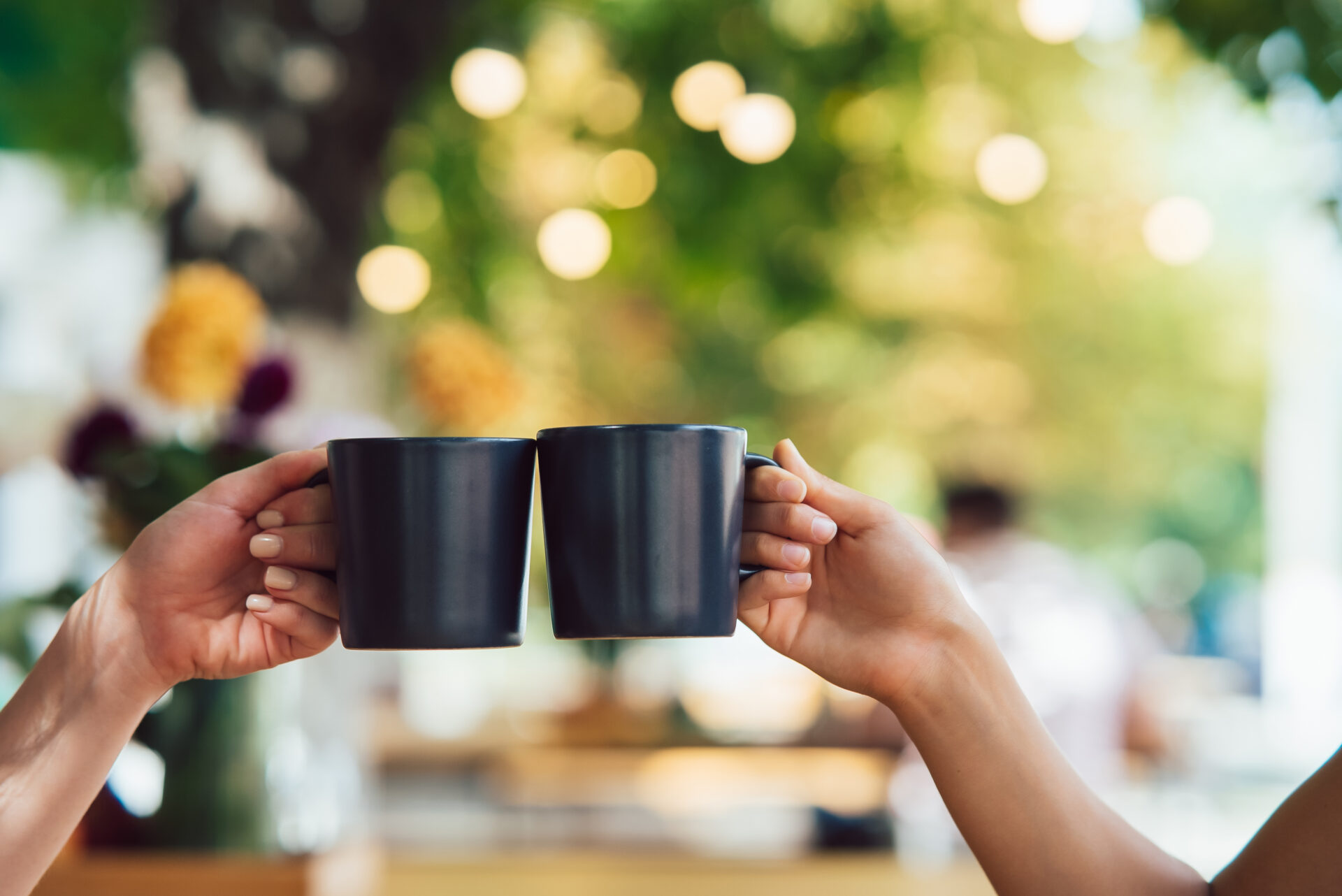closeup image of a people clinking coffee cups tog 2022 10 28 22 02 43 utc