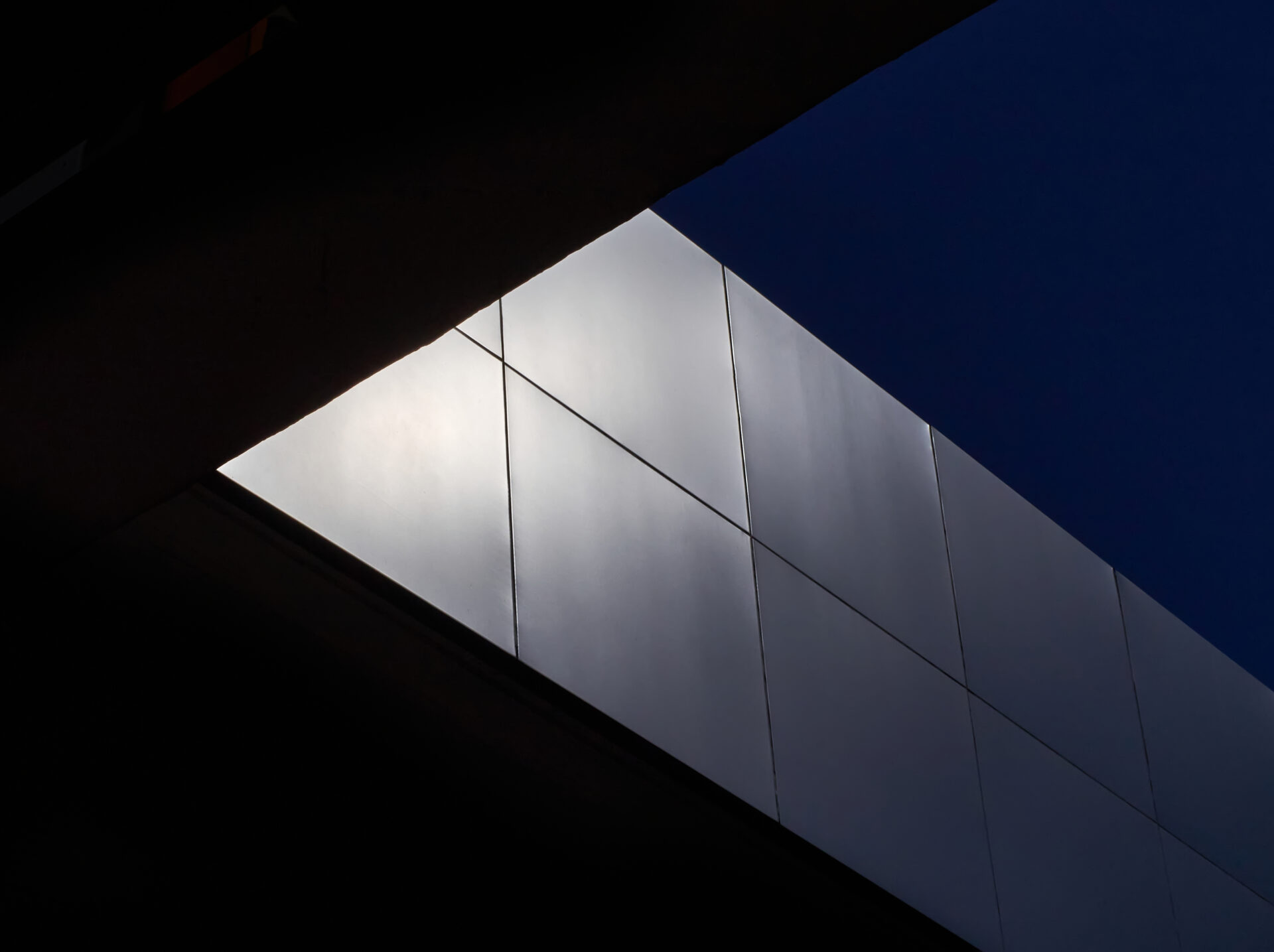 light and shadow on the metallic surface of buildi 2022 12 07 04 49 55 utc