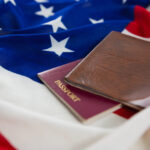 passport and visa on an american flag 2021 08 28 18 32 44 utc