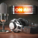 vintage microphone and headphones with signboard 2021 08 26 16 57 03 utc 2