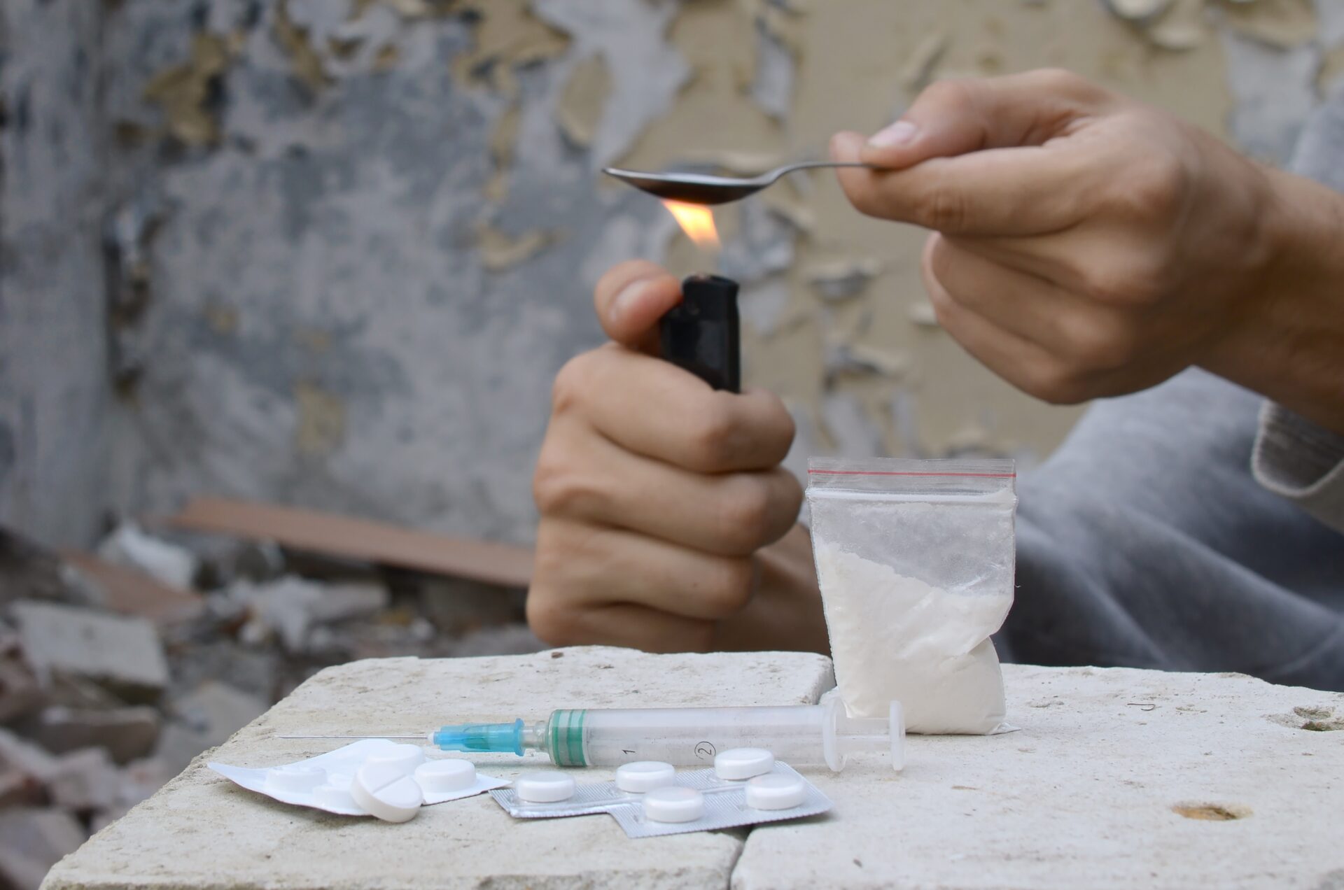 hands of drug addict melting cocaine in a spoon ho 2022 11 14 17 08 48 utc