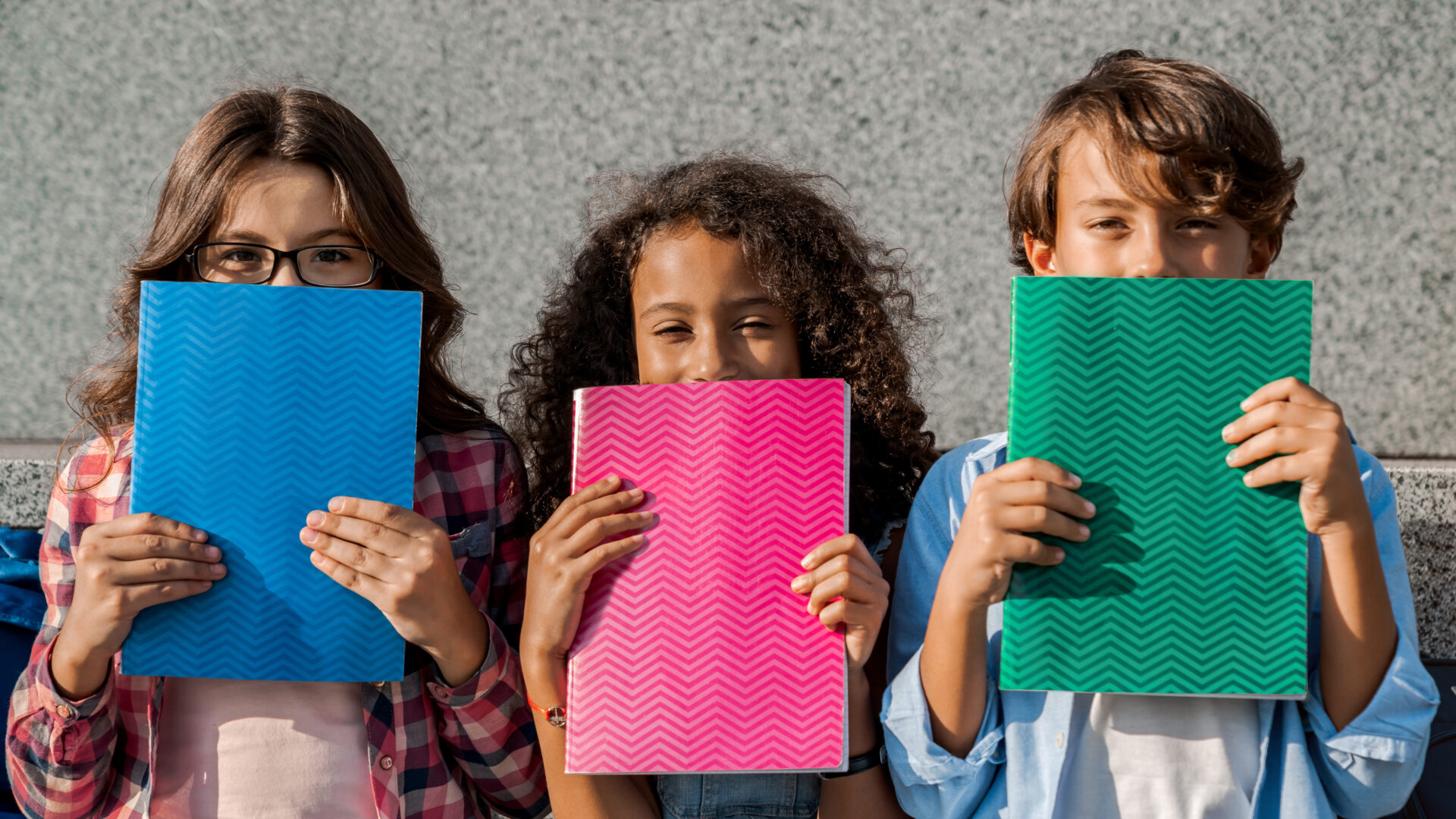 happy multiethnic school kids holding notebooks cl 2022 04 20 16 56 58 utc