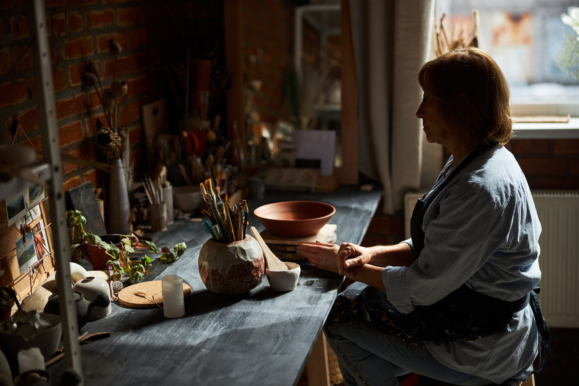 nice female ceramic artist working in pottery work 2022 03 09 03 12 58 utc